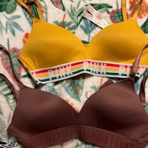 2 pink bras